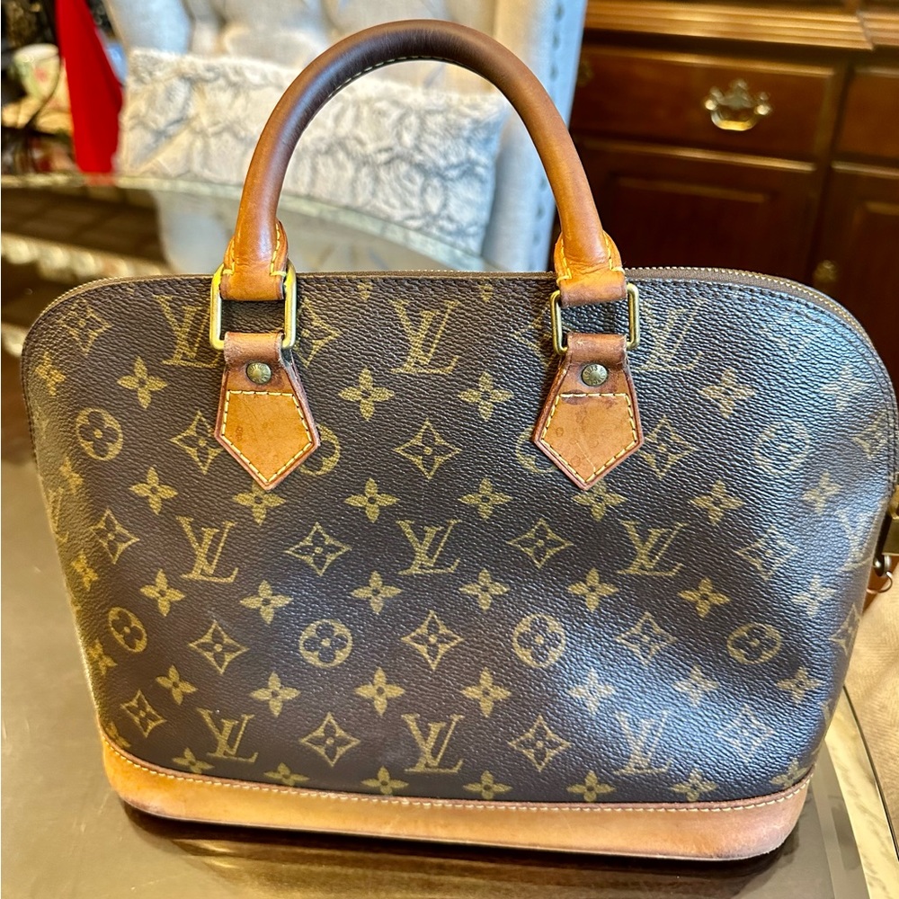 Authentic Louis Vuitton Alma satchel